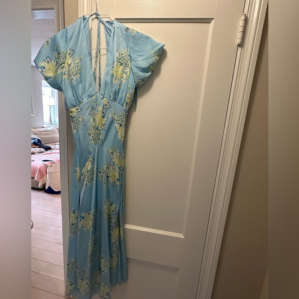 Free people floral satin dress. Size medium. Cross back. Worn once!